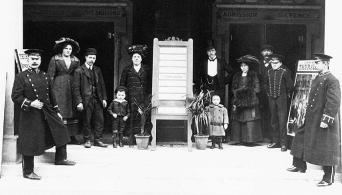 The staff in 1912, left to centre: Jack Short (Doorman) - Miss Wills (Cashier) - John Barker (Operator) - John H. Barker (age 2) - Alice A Barker (Cashier). Centre to right: Frederick Benton (Manager and Occasional violinist) - Ralph Benton - Mrs Benton (Pianist) - Mr Timms (Engineer) - 'Robbie' Robinson (Pageboy) - Mr Symes (Doorman)Photo Courtesy: John H Barker (pictured fourth from left as a boy).