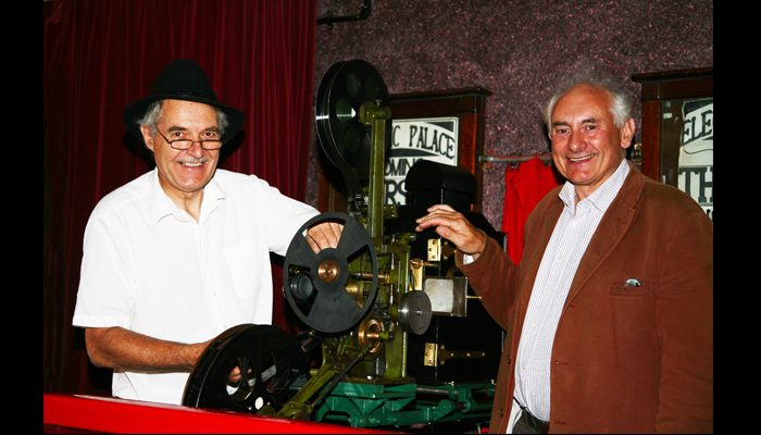 A very special presentation of films of the early 1900s shown on an original hand turned projector of 1912 with commentary by David Cleveland.Nigel Lister (left) and David Cleveland.